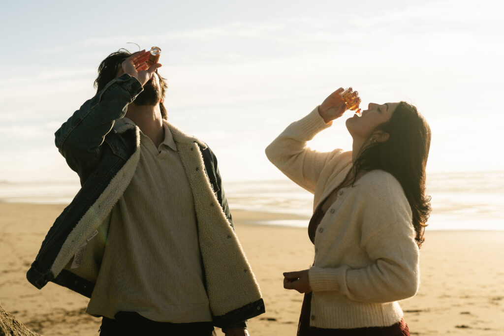 Couple taking a shot on the beach
