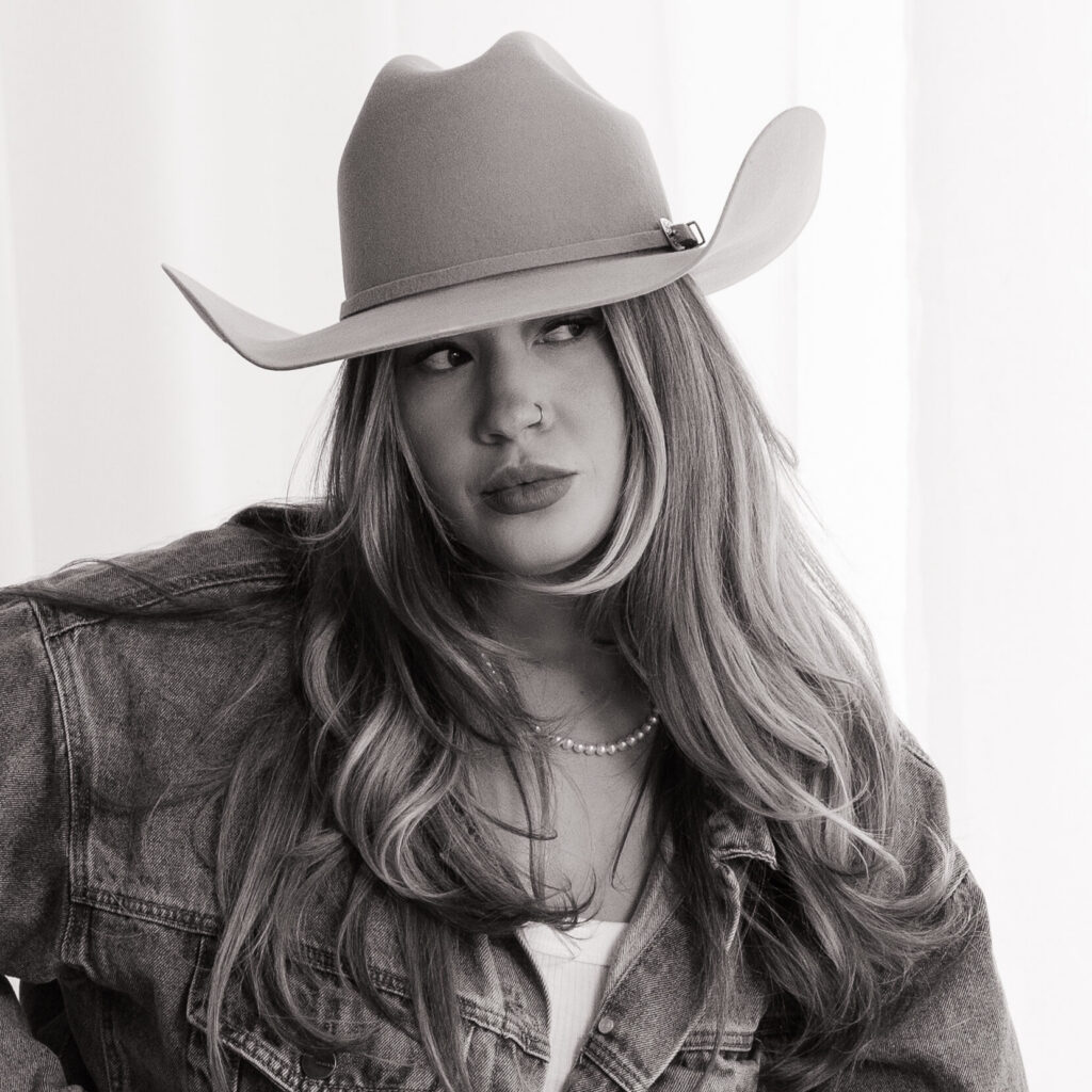 Cowgirl inspired professional headshot of photographer Jacque O