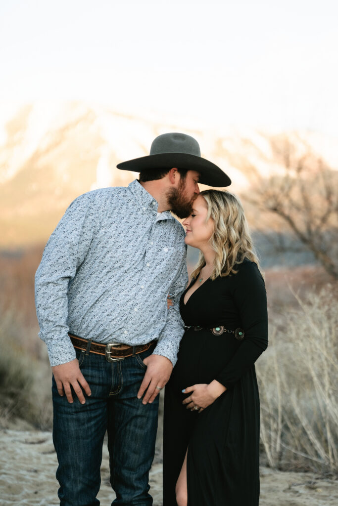 Man kissing his pregnant wife